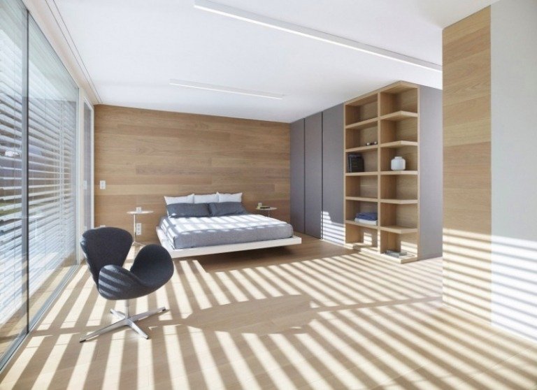 moderna sovrum-trä-golv-väggbeklädnad-flytande-säng-grå-accenter