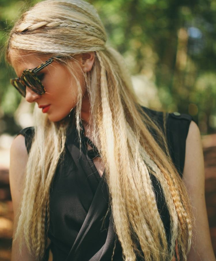 80-tal-frisyrer-långt-hår-krympande-solglasögon-stor-klänning-svart
