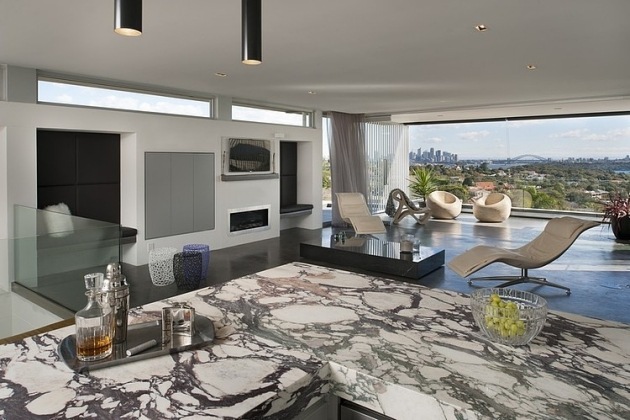 vardagsrum-design-moderna-möbler-levande vägg-kök område-marmor bänk