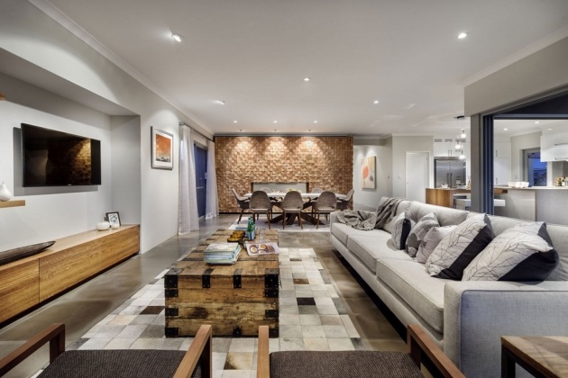 en-rums-lägenhet-rymlig-loft-stil-rustikt-bord-vardagsrum-väggar-grå-vit