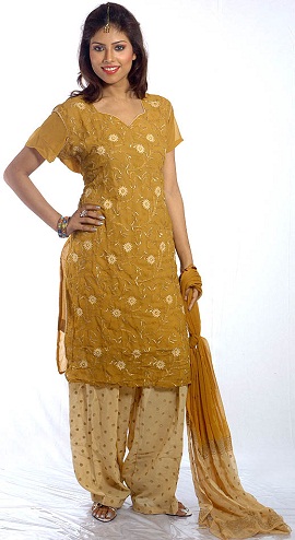 Kultainen puuvillainen Salwar -puku