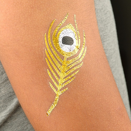 Χρυσό φτερό τατουάζ