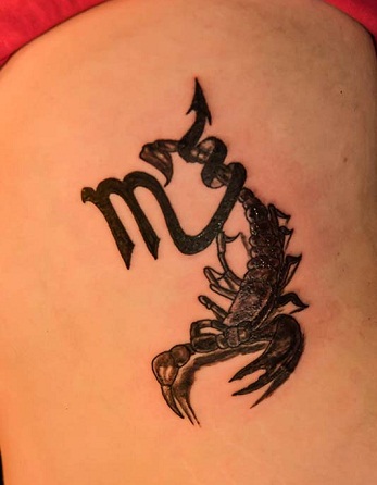 Skorpioni -symboli skorpionin kanssa