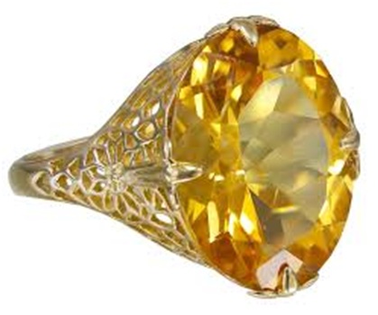 Μεγάλο κίτρινο Topaz σε κομμένο χρυσό δαχτυλίδι: