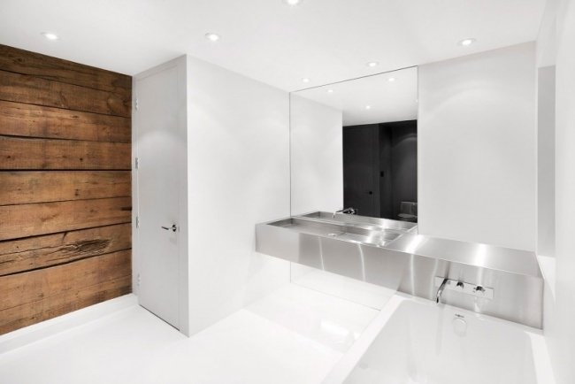 badrumsdesign vit minimalistisk trävägg av metall