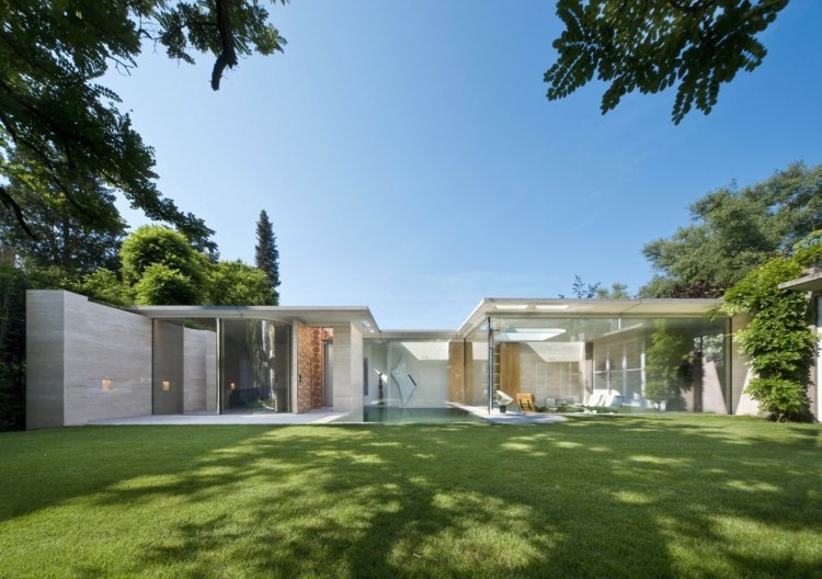 rundade väggar fasad-glas-gräsmatta-minimalistisk-idé