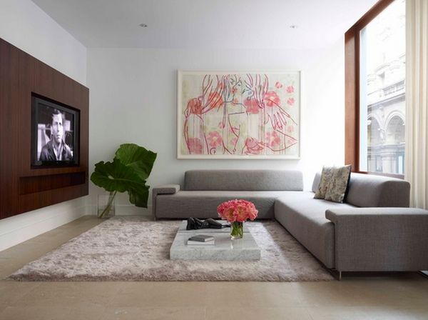 Väggkonst vardagsrumsidé abstrakt fluffig mattgrå soffa