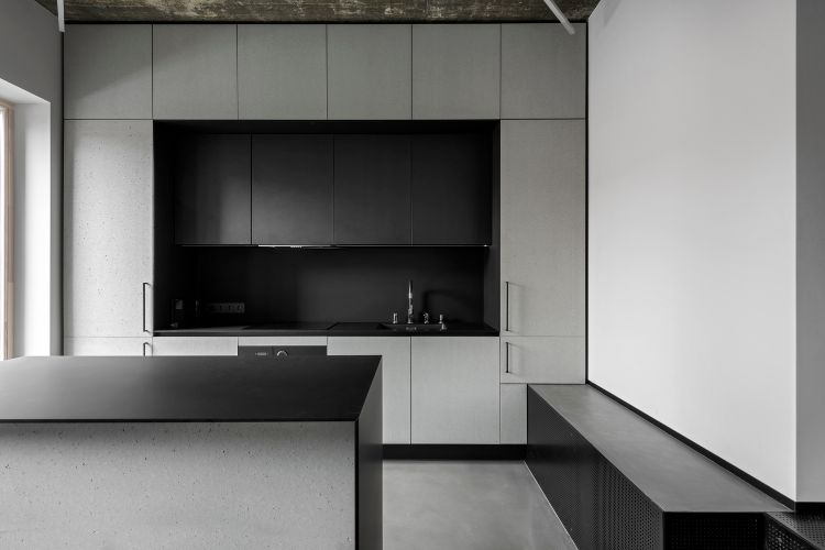 minimalistiskt inbyggt kök kombinerat svart gråvit monokrom modern utrustning