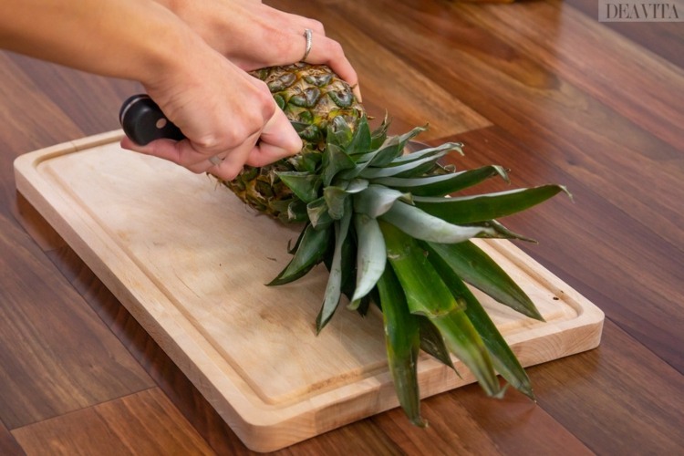Korrekt skuren ananaskrona ta bort botten