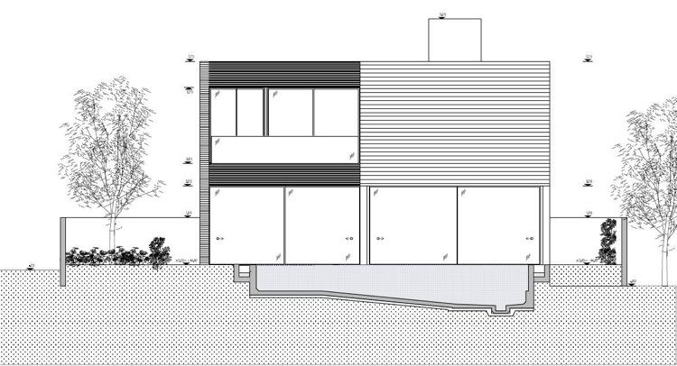 Enfamiljshus med upphängd fasad och glasfronter och planlösning av platt tak