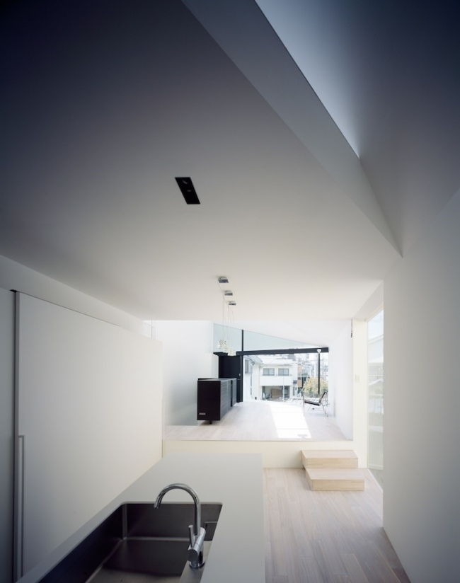 Kök område loft vardagsrum öppet för innergården design