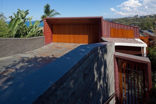 enfamiljshus arkitektur turner konstruktion modernt garage stenplattor trä