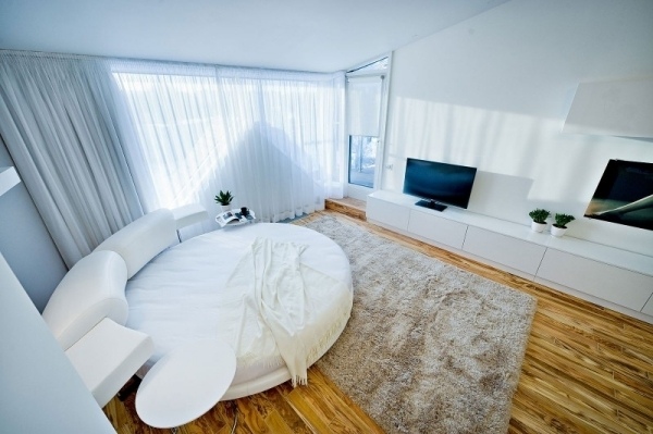 Loft lägenhet sovrum rund säng