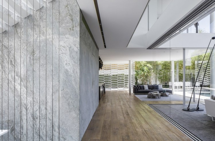väggdesignidéer grå-betong-optik-öppet-vardagsrum