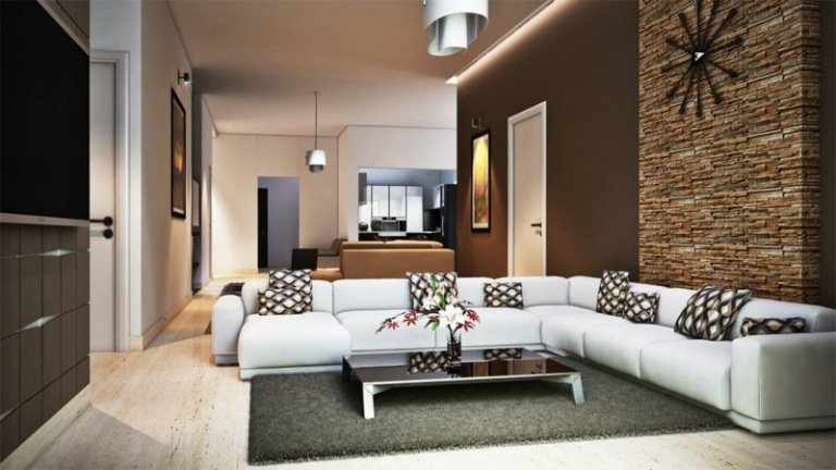 väggdesign i vardagsrummet accentvägg stenbrun väggfärg vit soffa