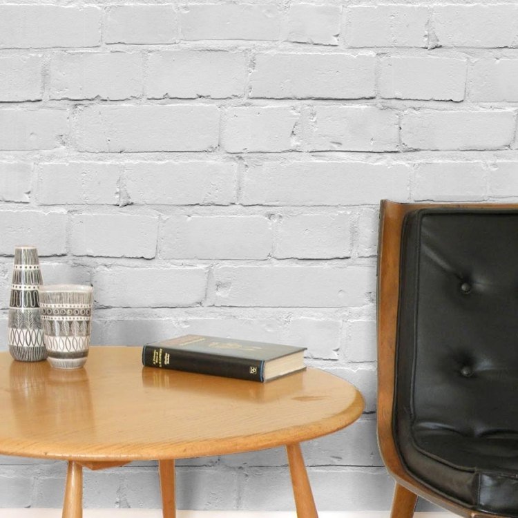 tegel-tapet-vägg-design-vit-vägg-färg-skandinavisk-design-sidobord-fåtölj-läder-sittdynor