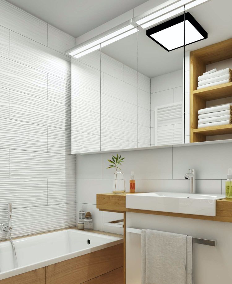 badrum vitt trä med badkar och väggplattor