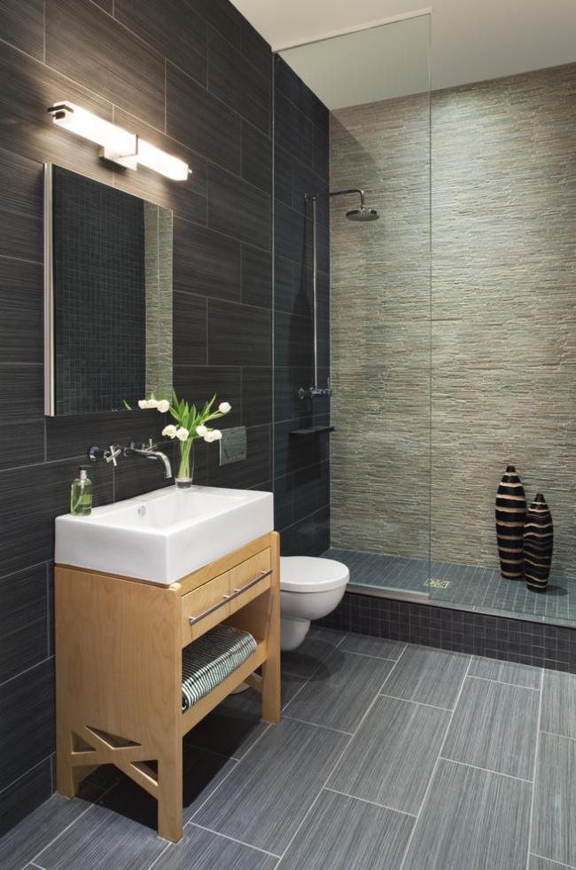 modernt badrum val kakel natursten ser grå väggplattor