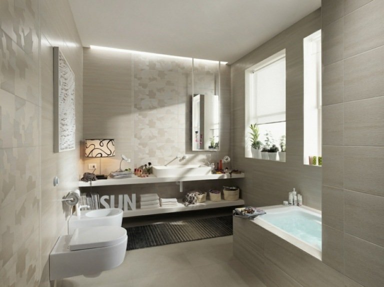 badrumsdesign med kakel noll vit grå liten tvättkonsol för badrum