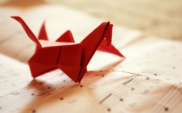 pyssla med barn origami rött papper anteckningsbok djur