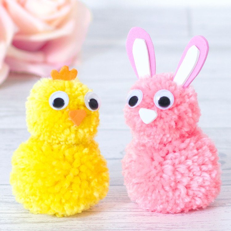 Bunny och chick gör hantverk av ull till påsk