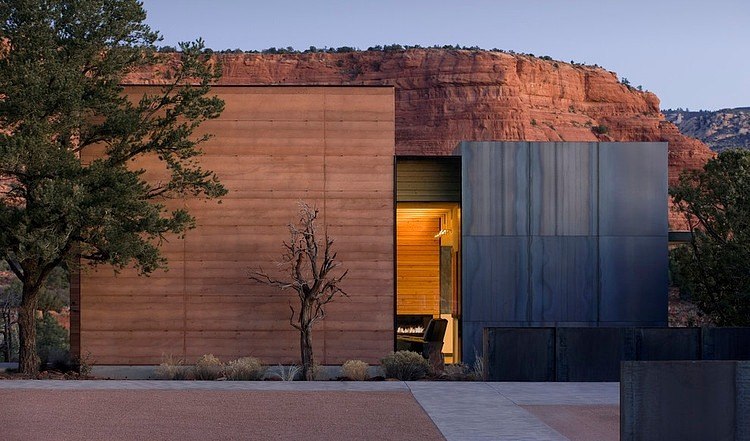 byggnad med ramad jord hybridmaterial modern arkitektur design lervägg