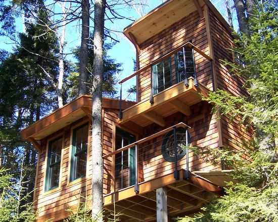 hus i skogen trädhus exteriörbeklädnad fasaddesign med trä