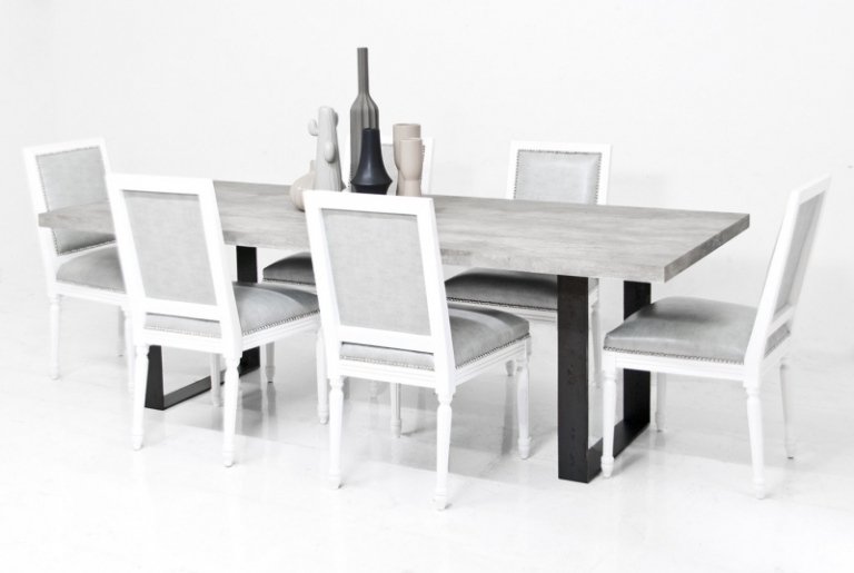 betong-design-modern-matbord-metall-ram-stolar-vit-klädsel-dekoration-minimalistisk-grå