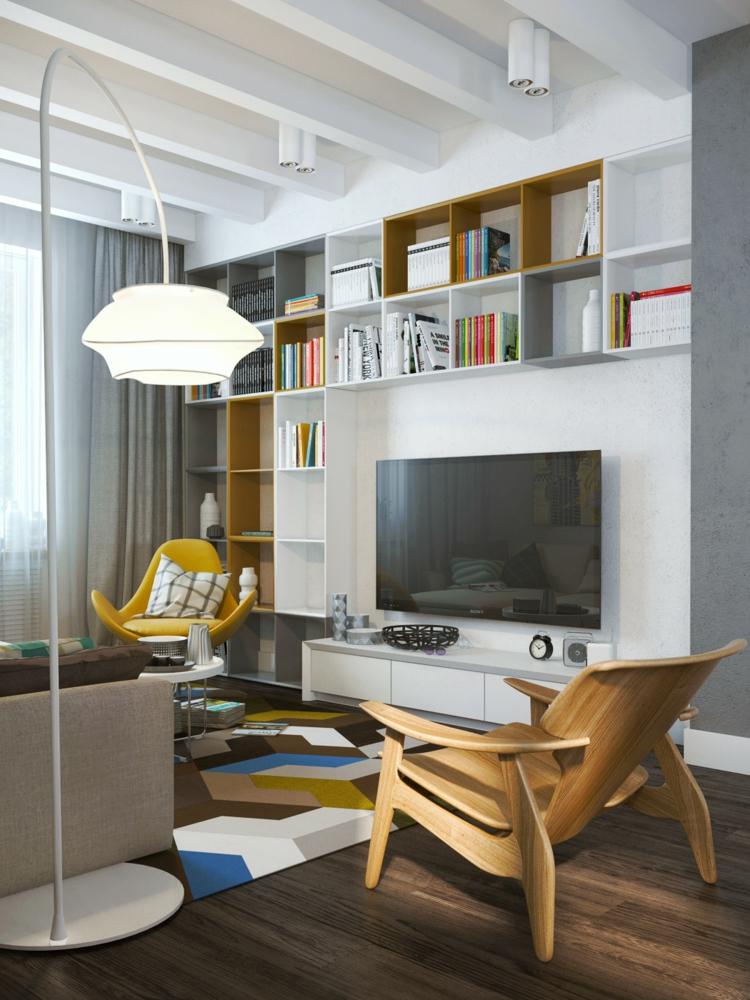 betong-färg-vardagsrum-trägolv-trä fåtölj-golvlampa-bokhylla-vit-grå