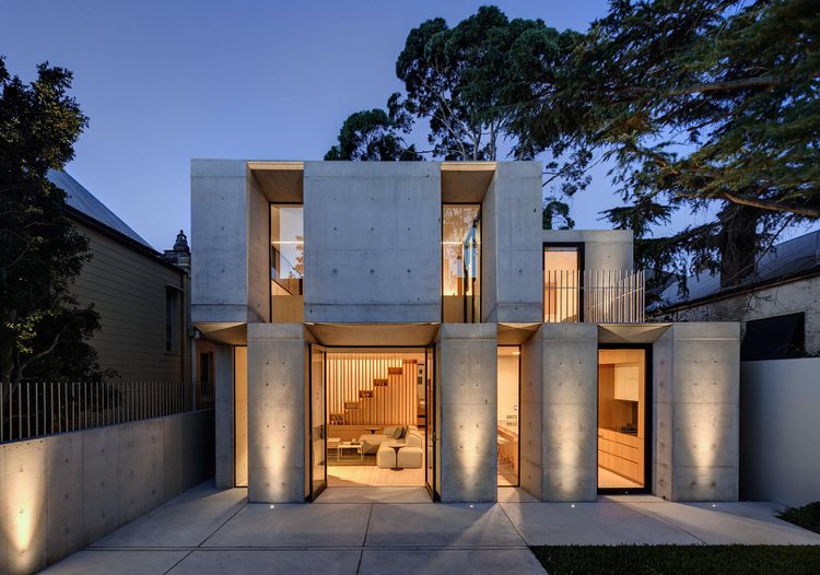 betongträhus fasadbelysning fönster minimalistisk arkitektur