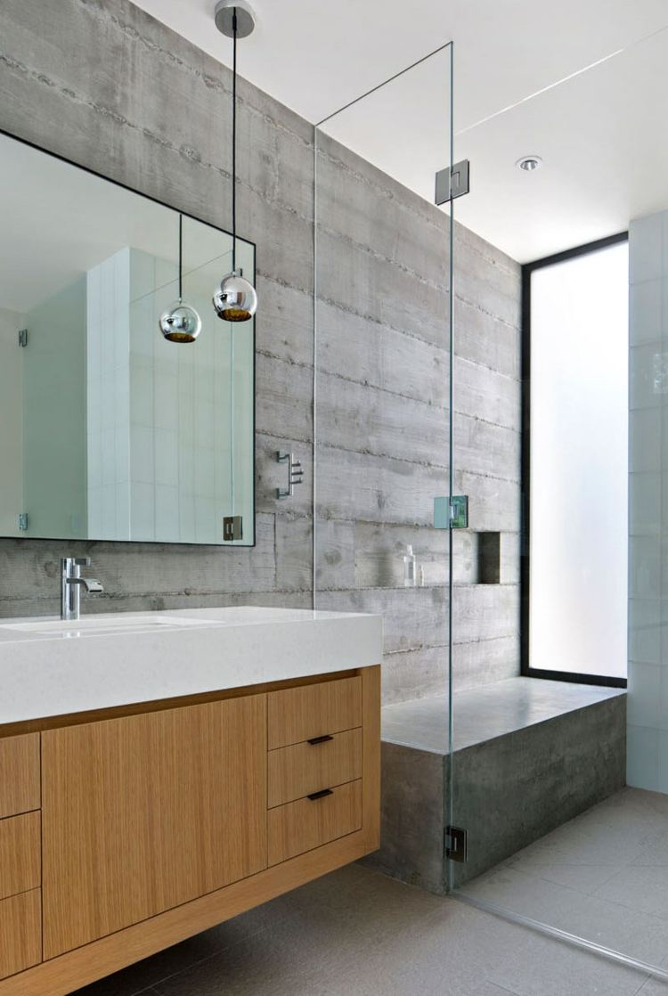 betong-vägg-badrum-minimalistisk-hängande-lampa-tvätt skåp