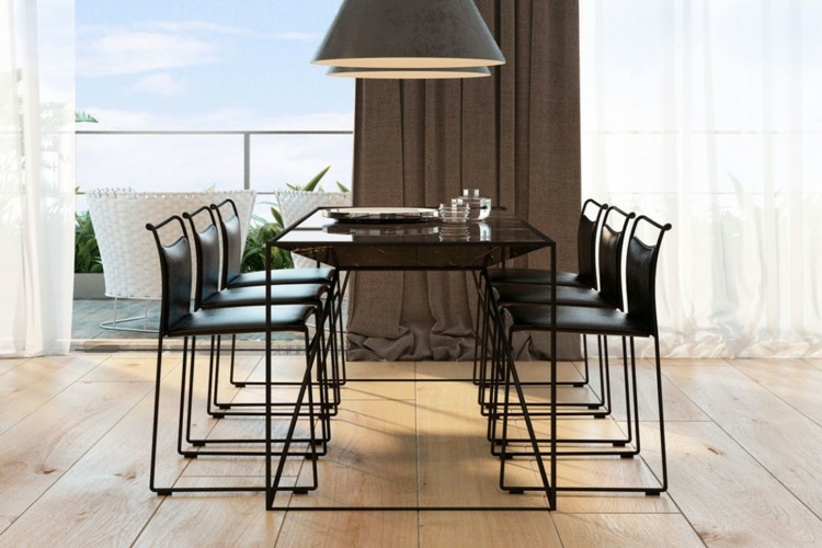 väggpaneler-betong-minimalistisk stil-matplats-glas-bord-metall-möbel-läder
