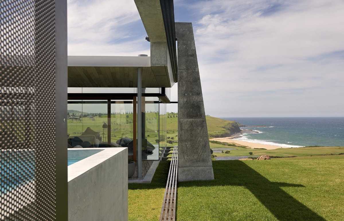 Bygg en bondgård i betong i Australien med havsutsikt och oändliga gräsmattor