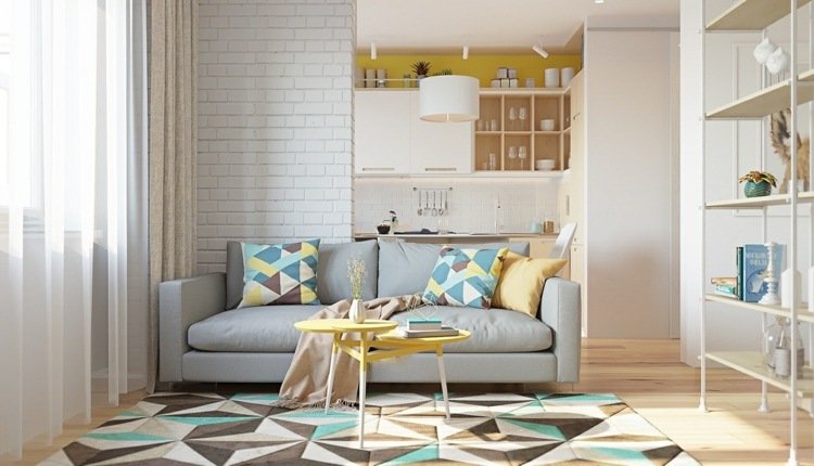 Sängen i vardagsrummet integrerar geometrisk-mönster-bensin-gul-turkos