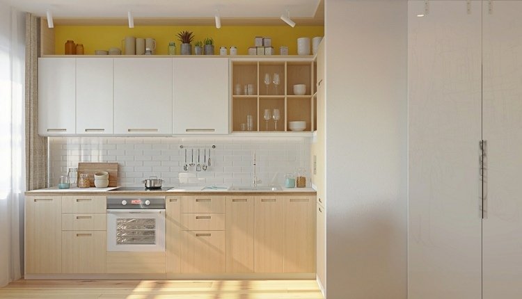 Sängen i vardagsrummet integrerar en färg-accent med öppet kök-senap-vägg