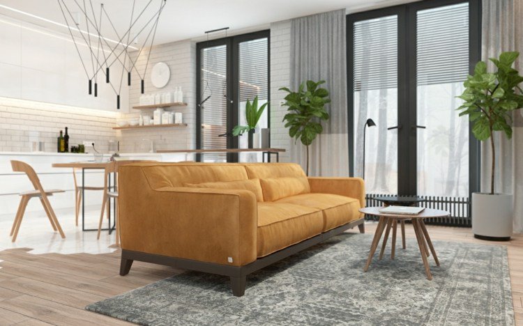 säng-vardagsrum-integrera-soffa-färg-senap-grå-matta-vitt-kök