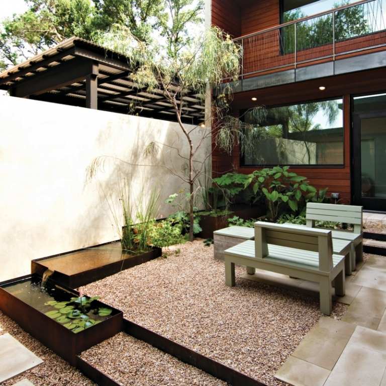 terrass design grus trämöbler fontän bilder idé