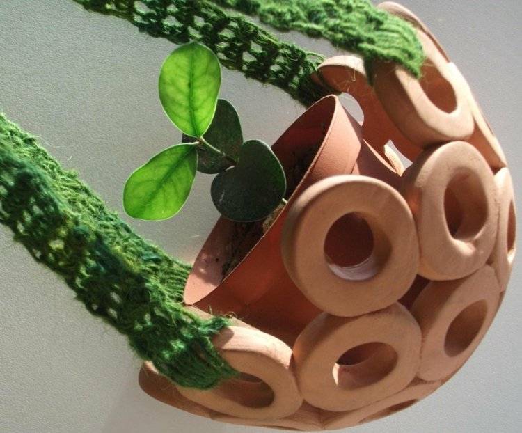 handgjord blomkruka design stickat växt retro ringar mönster