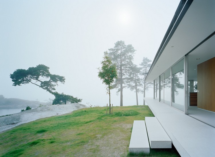 Svensk villa minimalistisk betongträdgård