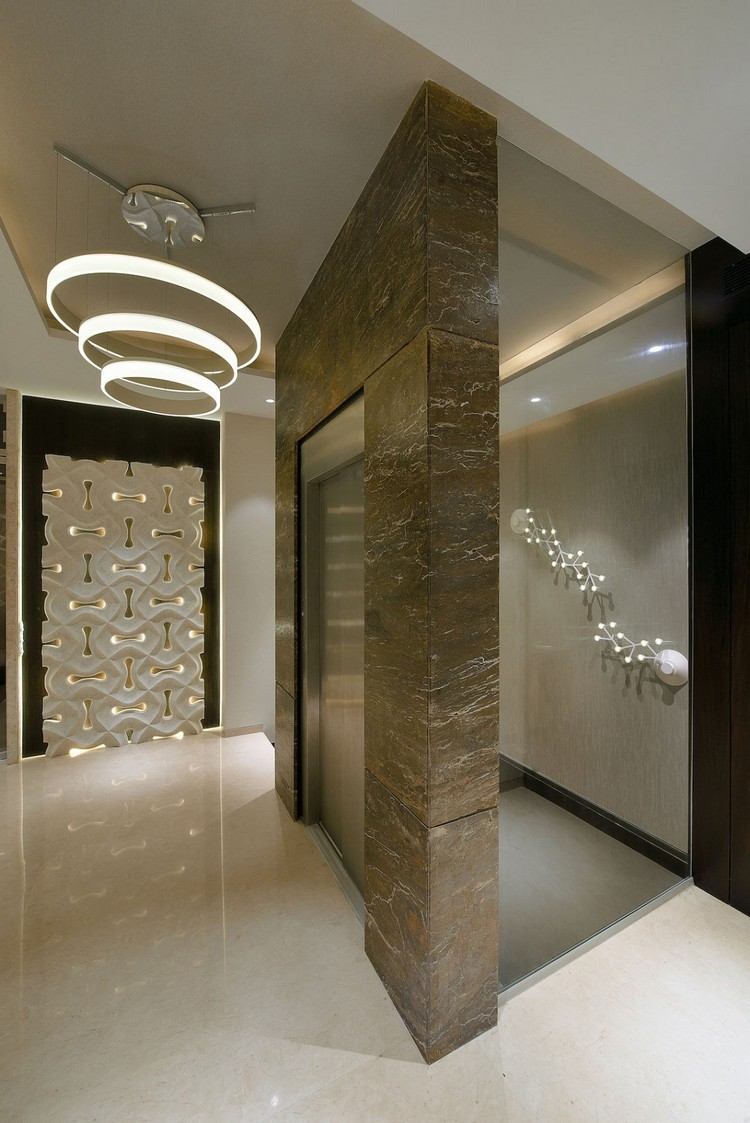 brun-toner-lägenhet-duplex-hiss-3d-väggpaneler-modern-ljuskrona-glaspartition