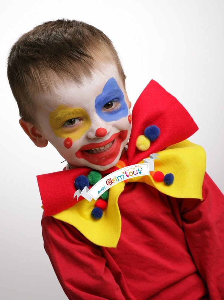 Clown-smink-barn-pojke-färgglada-ringar-ögon