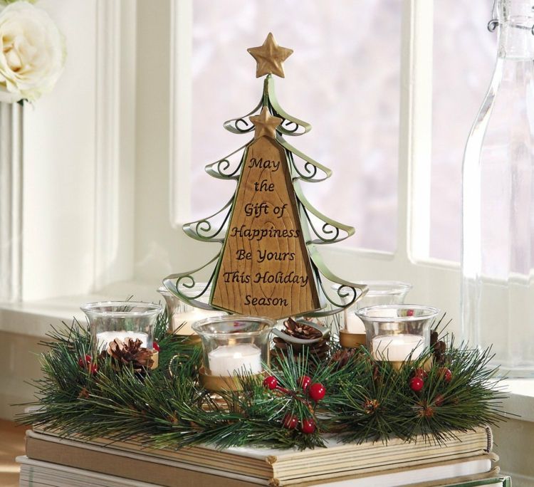 Juldekorera gran träd metall sammanflätade krans advent ljus
