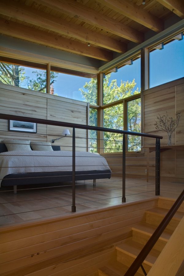modernt sovrum trappräcke glasfönster