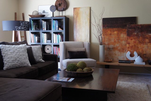 vardagsrum konstverk vaser grenar dekoration brygga soffa