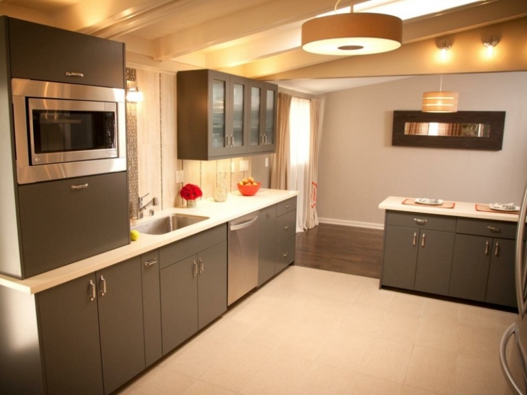 takljus kök runt moderna grå skåp elegant
