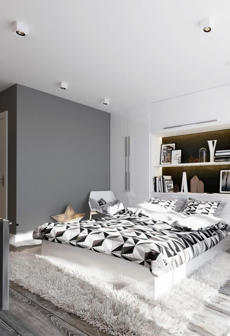 dekoration i sovrummet grå-kind-design-trä-figurer-bokstäver-hus-monokrom