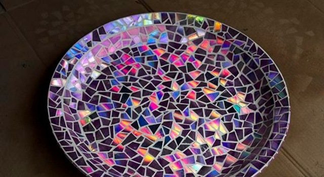 mosaikplatta cd -bitar lyser effektivt DIY