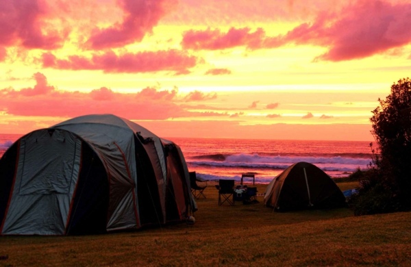 Camping strand tält solnedgång