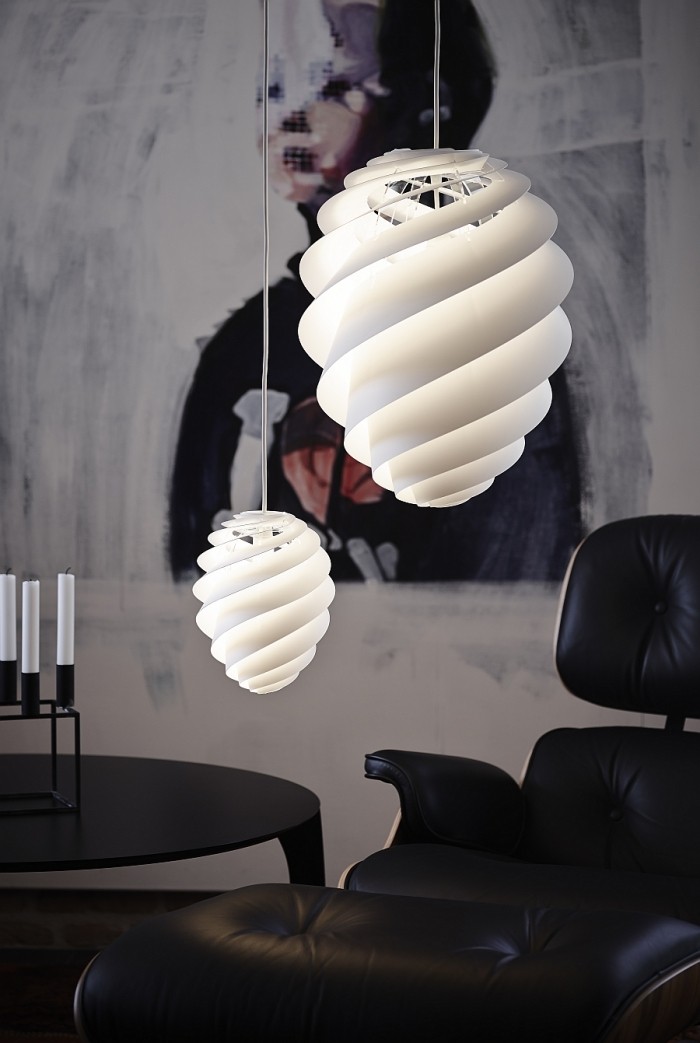 Virvel-hängande-lampor-av-virvlande-blad-inspirerade-Eames-Lounger-bakgrund