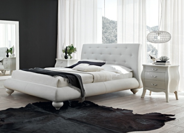 Sänggavel klädsel sovrum inrättat svart vitt